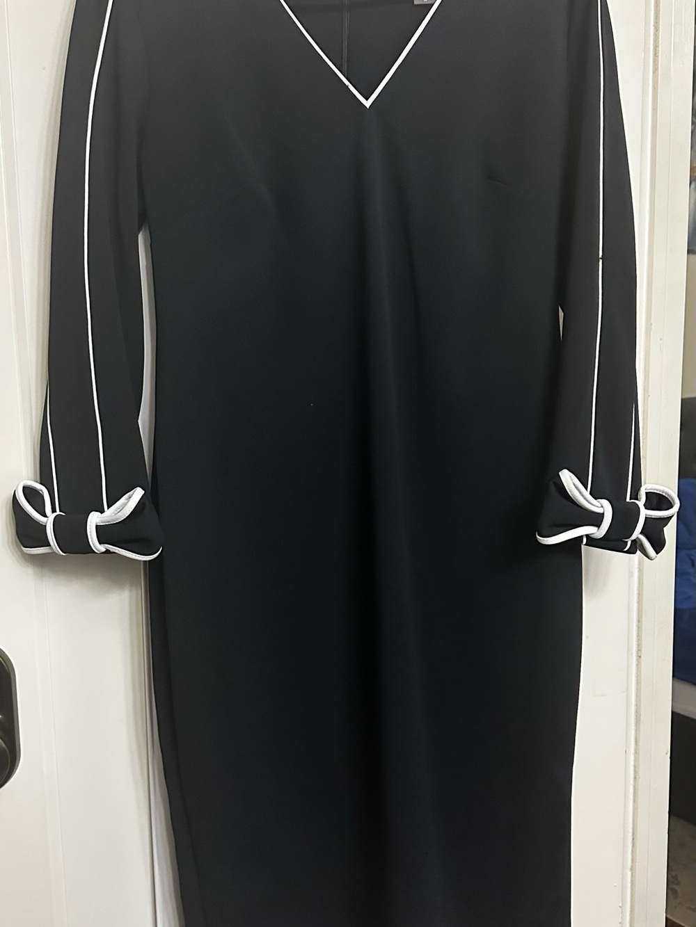 Andrew Marc Black V-Neck Long Sleeve Dress with White Trim and Bow Cuffs